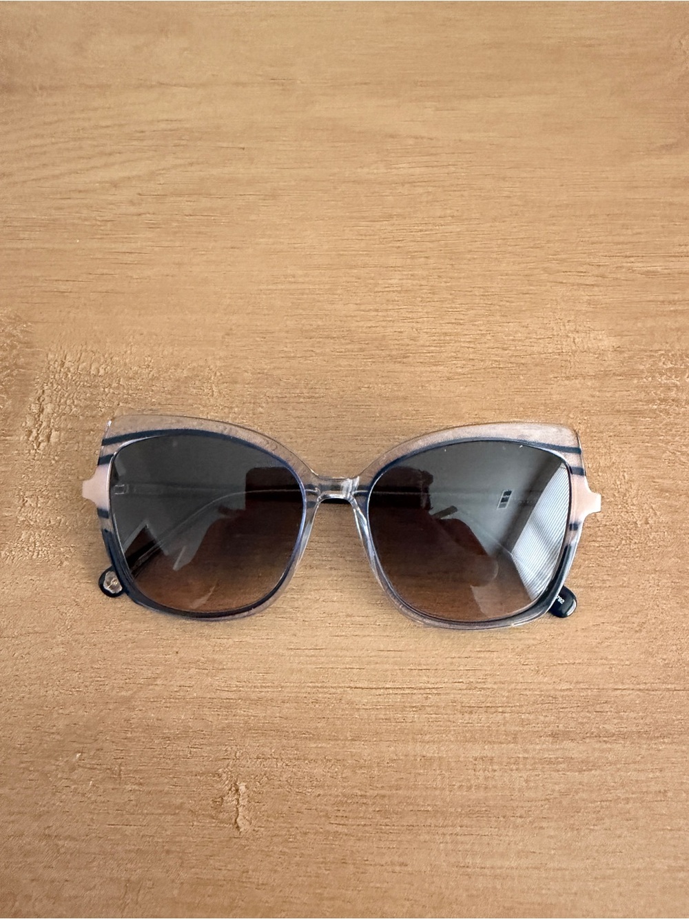 Trina Turk Translucent Taupe Frame Sunglasses with Gradient Brown Lenses